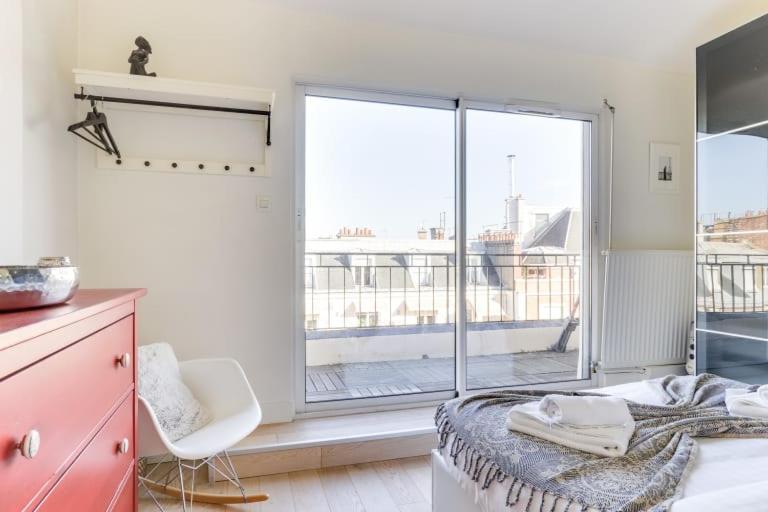 Guestready - Appartement Terrasse Vue Tour Eiffel París Exterior foto